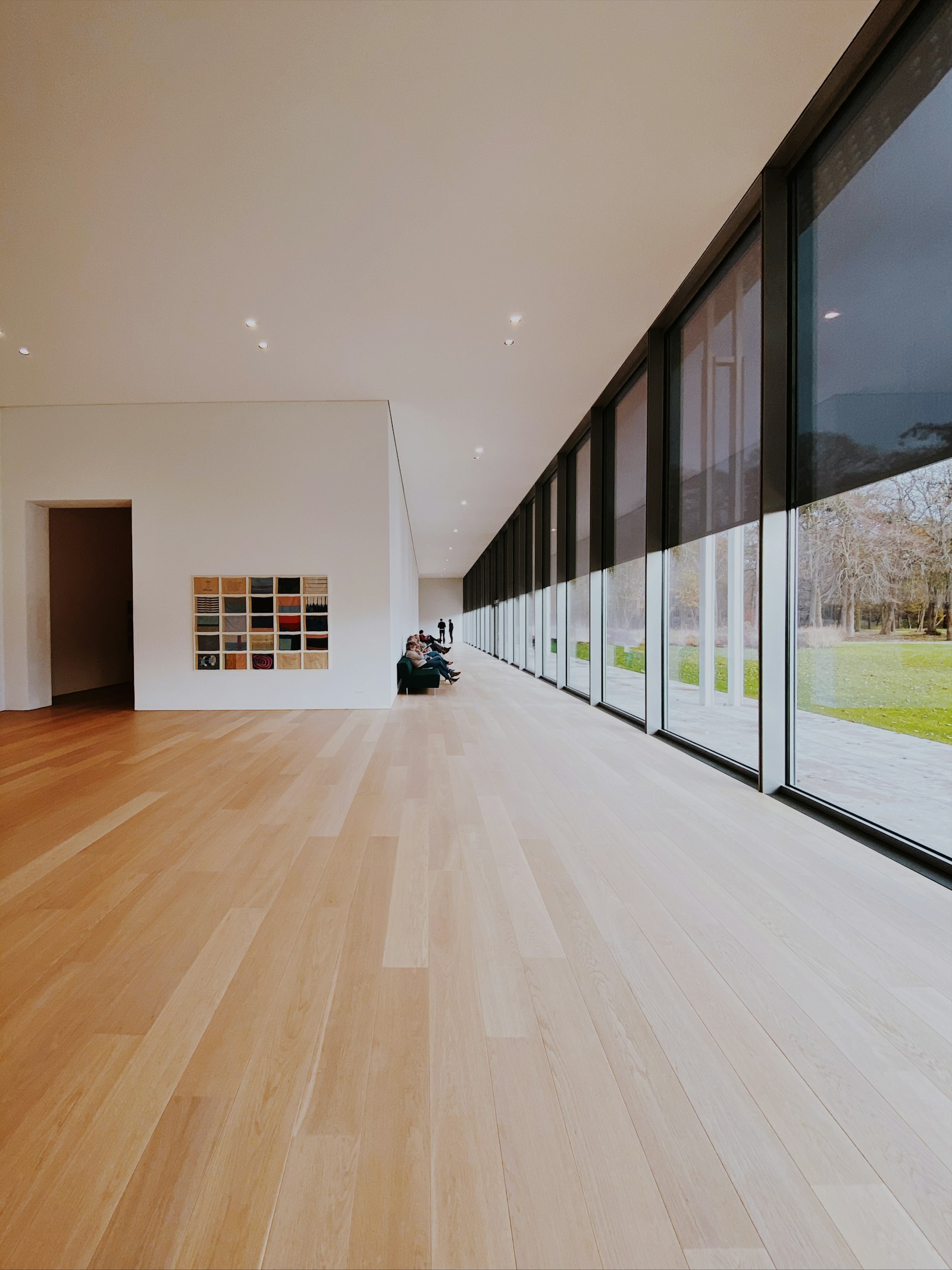 Light wood flooring in a bright interior — stock photo, not Hamid's showroom